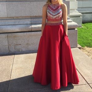 Red, two piece prom dress with sparkly accents.